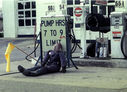 NJ2C_Freehold2C_Vanderveer_Gulf_Station2C_Gas_Pumps_sign_and_dummy_w_yellow_flag2C_1974.jpg